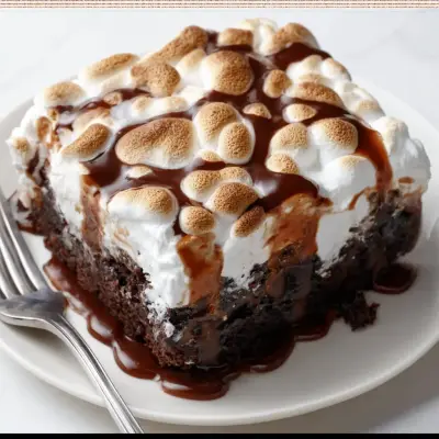 Delicious Chocolate Poke Cake with Marshmallow Topping | Easy Dessert Recipe